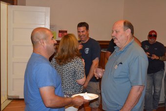 Lemoore Councilmember Ray Madrigal and Lemoore Fire Chief John Gibson wait for returns in the city's Depot.